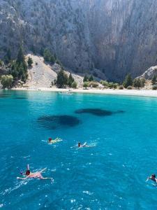 Late departure to Symi; express boat and amazing swim stop