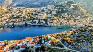 Late departure to Symi; express boat and amazing swim stop